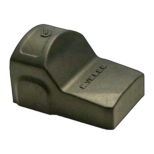 a close up of a metal object on a black background