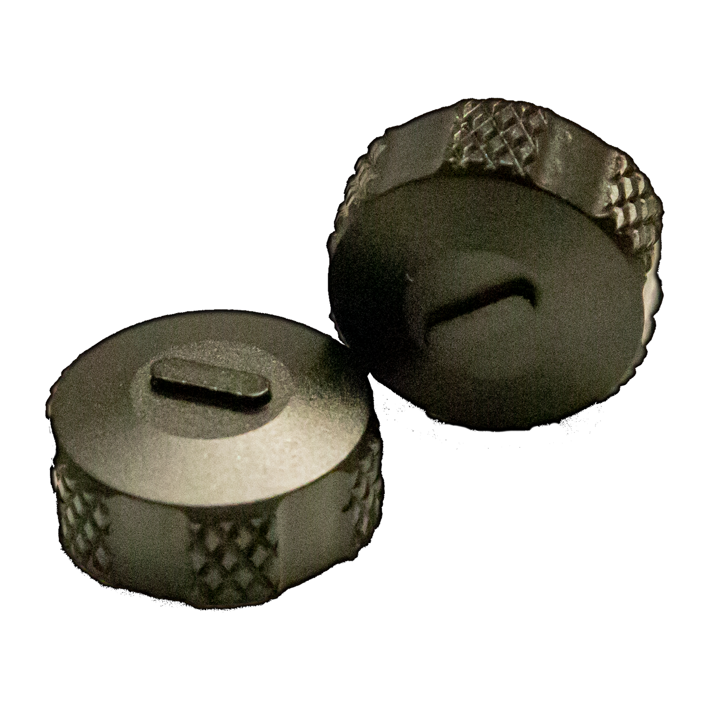 a pair of metal knobs on a black background